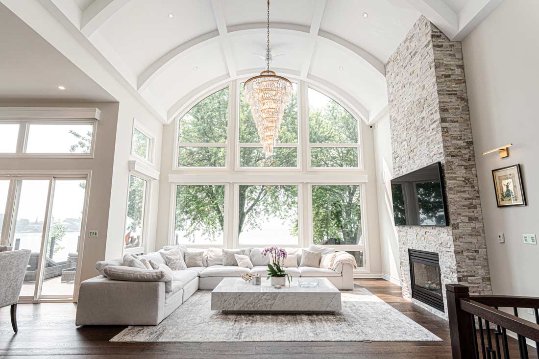 Barrel ceiling with river rock fireplace